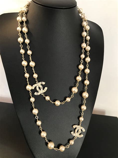 chanel pearl necklace with cc logo replica|chanel long pearl logo necklace.